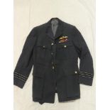 An EIIR RAF Wing Commander's tunic with pilots badges and medal ribbons