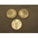 Three Mexican silver dollars - 1993 and 1994