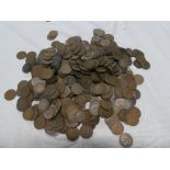 A large selection of mixed pre-decimal pennies,