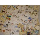 A box containing a large selection of GB first day covers, PHQ cards,