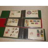 Three albums containing a collection of GB first day covers 1950-1980s