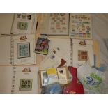 A box containing various albums of GB and World stamps,