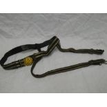 A post 1902 Naval Officer's sword belt with gilt buckle and sword slings