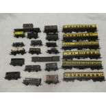 Six various OO gauge GWR coaches including Tri-ang and a selection of various OO gauge goods wagons