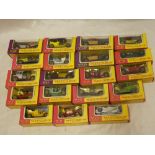 Nineteen Matchbox Models of Yesteryear vehicles in pink/yellow window boxes