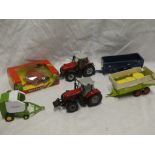 Two diecast Massey Ferguson tractors with trailers, boxed Britain's seed drill,