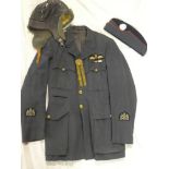 A Second War RAF warrant officer pilot's tunic dated 1945 with brass buttons and pilot's wings