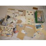 A box containing numerous albums of World stamps, covers,