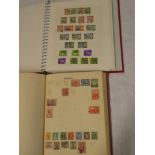 Two folder albums containing a selection of British Commonwealth and World stamps,