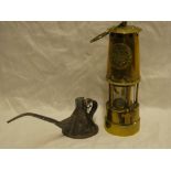An all brass miner's Davy lamp by the Protector Lamp and Lighting Company together with a long