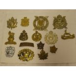 A collection of Canadian military badges including Canadian Scottish, Nova Scotia Highlanders,