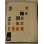 A folder album containing a collection of Africa stamps,