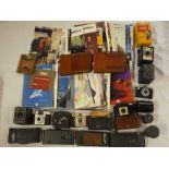 A selection of various old cameras, photographic plates, Vivitar lens,