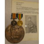 A First War pair of medals with bronze memorial plaque awarded to No. 28398 Pte. T.J.