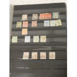 A stock book containing a collection of Trinidad and Tobago stamps with a wide range of early