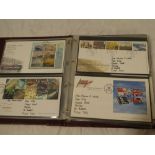 A cover album containing a collection of over 70 GB first day covers 2002-2006