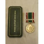 A Woman's Voluntary Service medal,