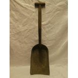 An old Great Western Railway locomotive shovel marked "GWR BF OCT 40" with wooden handle,