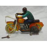 A tin-plate clockwork motorcycle and rider