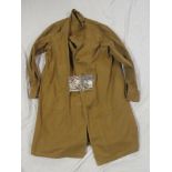 An original Second War woman's Land Army Khaki overall coat dated 1943,