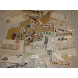 A box containing a large selection of various GB first day covers,