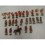 Twenty-five Britains plastic Highlander soldiers including one on horseback