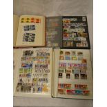 Four albums/stock books containing a selection GB stamps including commemorative, regionals,
