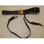 An EIIR Royal Naval Officer's black leather waist belt with gilt clasp and sword,