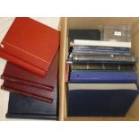 A selection of empty stamp folder albums, three stamp boxes, catalogues,