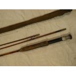 A good quality split cane fly rod with one extra tip by Milwards "Flycraft"