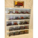 Twenty various mint and boxed diecast tractors and a Corgi boxed Thornycroft bus