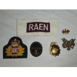 A United States Signal Corps Officer's cap badge and pin badge,