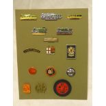 A collection of railway related buttonhole and lapel badges including GWR locomotive badges,