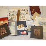 A box containing three stock books of GB and Channel Islands stamps,
