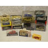 A selection of mint and boxed diecast vehicles - cars and other vehicles including Days Gone,