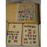 Three folder albums containing a selection of British Commonwealth stamps