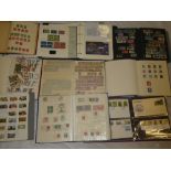 Eleven various albums/stock books containing GB and World stamps,