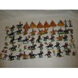 A selection of over 50 Britains plastic Red Indian figures including 35 on horseback together with