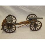 A modern model of a Napoleonic Field gun and limber with accessories 20" long overall