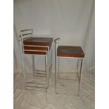 A set of four Italian "Lapalma" laminate wood and metal stacking bar stools