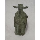An unusual Eastern bronze hanging bell in the form of a bearded gentleman,