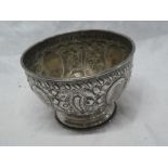 A Victorian silver circular pedestal bowl with raised floral and scroll decoration, 4½" diameter,