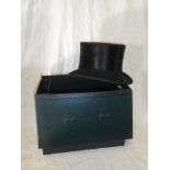 A gentleman's black top hat by Austin Reed in fitted case