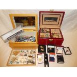 Two jewellery boxes containing a quantity of various costume jewellery including necklaces,