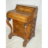 A good quality mid-Victorian burr walnut piano topped Davenport with drawers and sliding adjustable