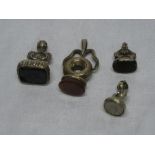 Four various 19th Century gold plated fob seals