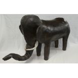 A rare Liberty & Co brown leather footstool in the form of an elephant,