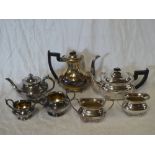 A silver plated four piece tea and coffee set with decorated edge and one other silver plated tea