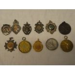 A 9ct gold Physical Culture medal, various silver sporting medallions, fobs,