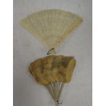 A 19th Century Japanese carved ivory fan with figure and landscape decoration,